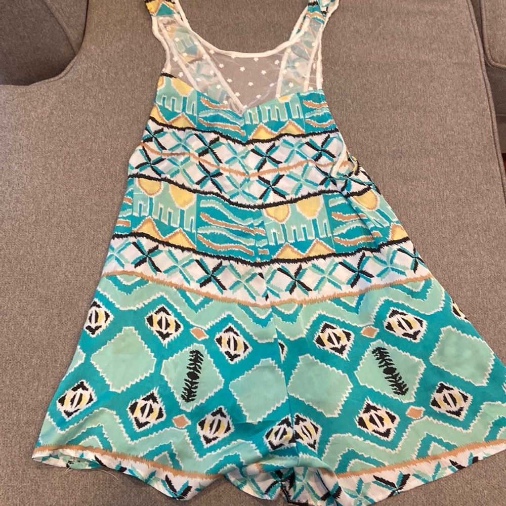 Kiwitucker LF Romper Medium never worn!
